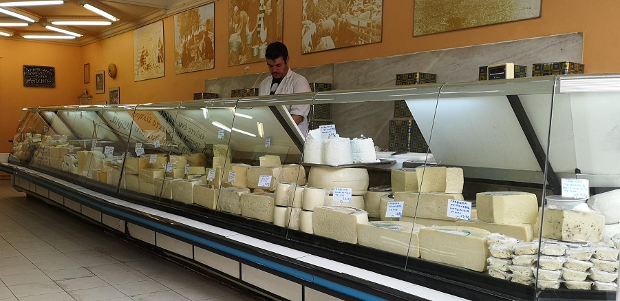Goats and cow scheese counter with seller
